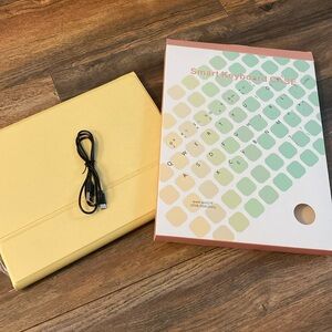 This is a brand new, smart keyboard case with mouse